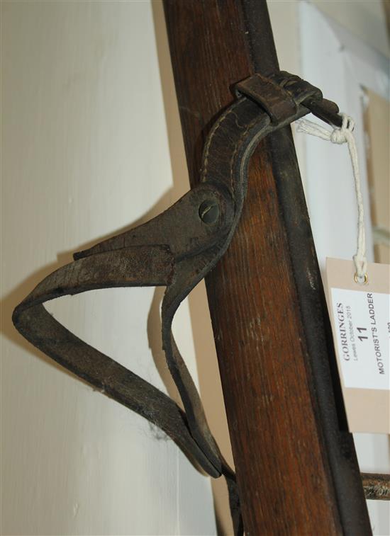 A Hodgkinsons patent oak and metal folding motorists ladder, overall 9ft lng
